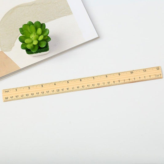Wooden tailor ruler with engraved cm and inch measurement markings