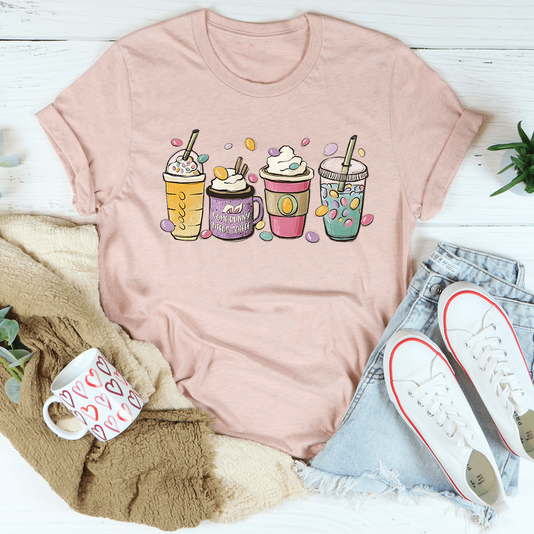 Soft pink crew-neck T-shirt with colorful Easter bunny drink graphic on front
