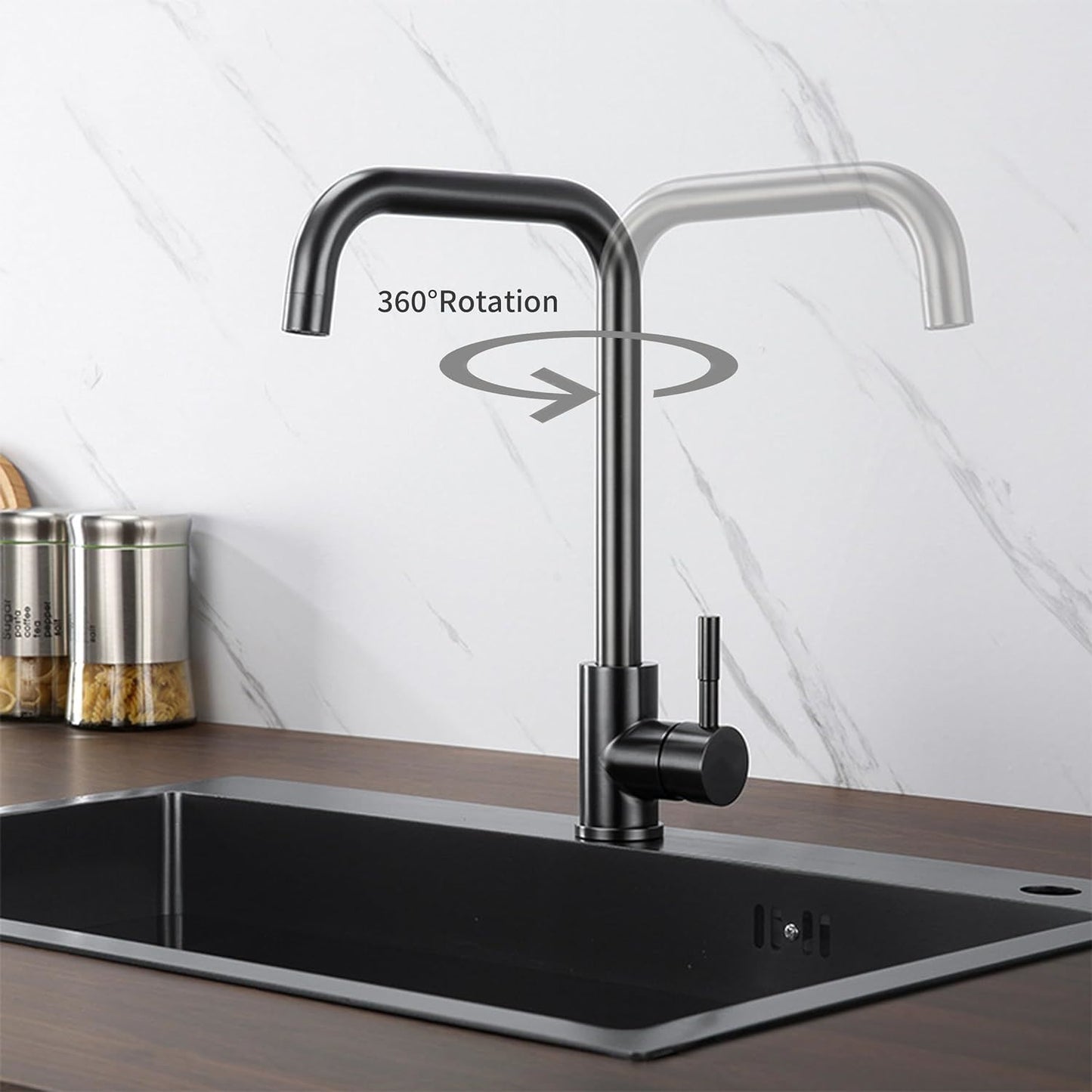 Pull-down kitchen faucet with arched spout and dual spray controls over sink