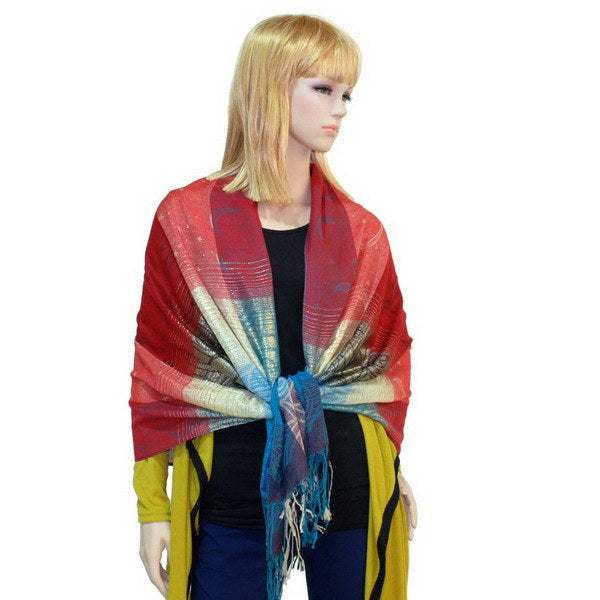 Tassel-trim pashmina shawl in red and teal plaid draped on model