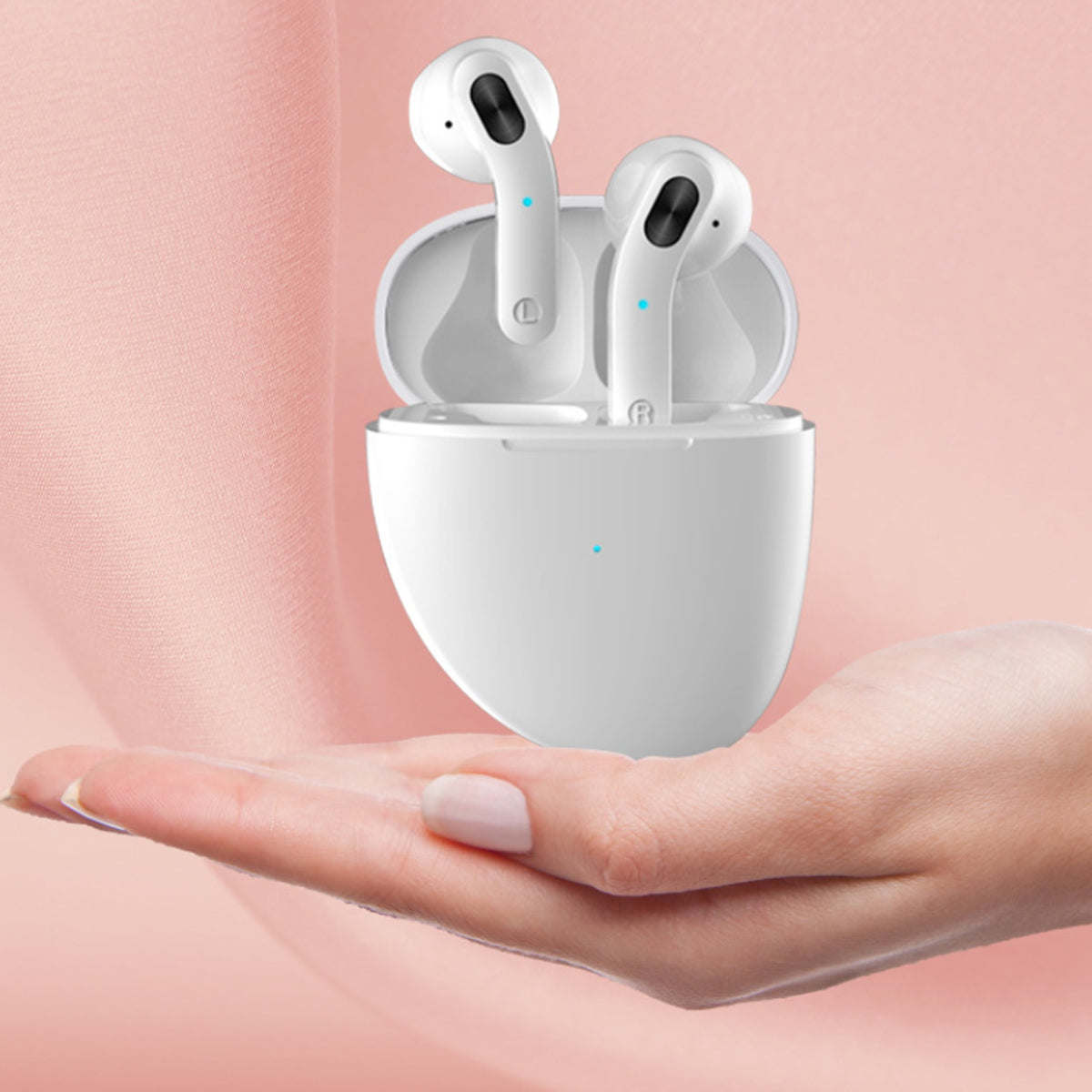 White twin Bluetooth earbuds in marble-look half-shell charging case with blue LEDs