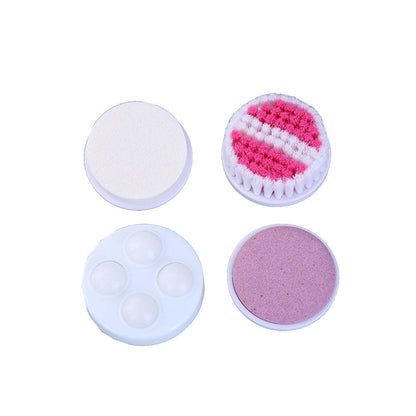 Assorted facial cleansing brush and sponge pads in white, pink, and lavender
