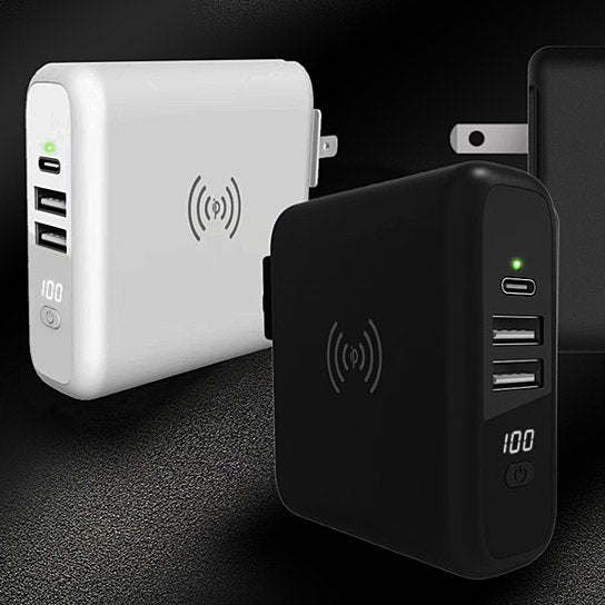 Black and white compact travel charger with wireless symbol and stacked USB ports