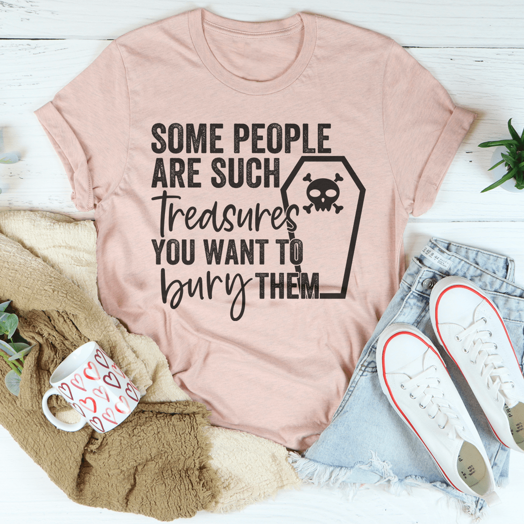 Heather mauve crewneck T-shirt featuring a front skull-and-treasure quote design