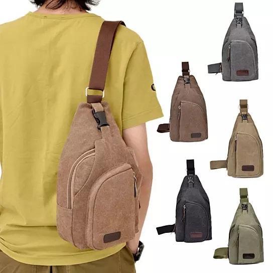 Tan cotton canvas messenger bag with adjustable sling strap and front zip pocket
