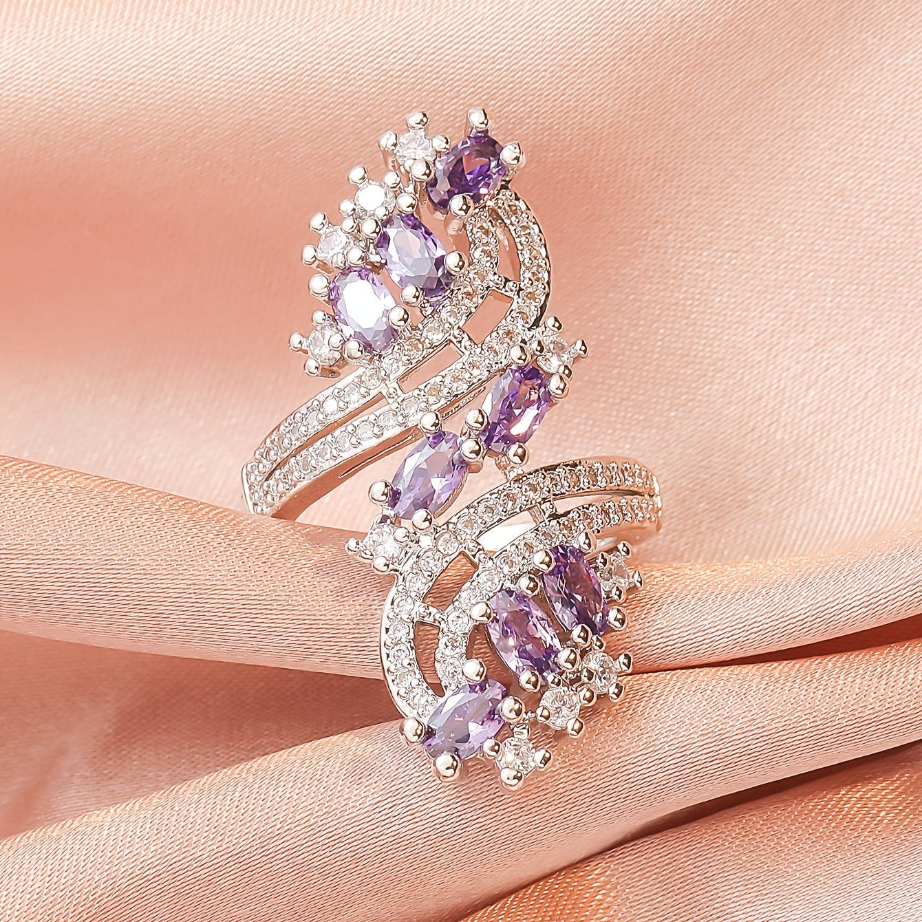 Rose-gold tone amethyst and clear rhinestone ring with stacked bands