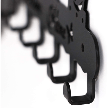 Black key hanger close-up showing curved hooks and cutout rose details