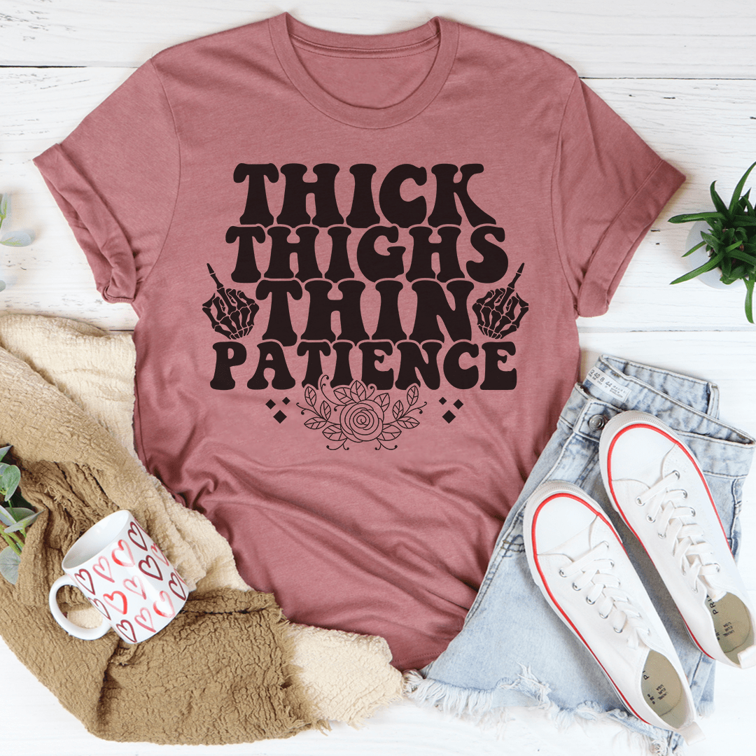 Mauve crewneck T-shirt with "THICK THIGHS THIN PATIENCE" graphic on front