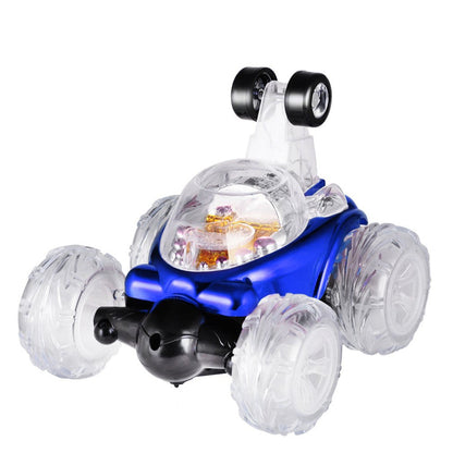 Mini RC stunt dump car with blue body and clear wheels, front headlight and side tires