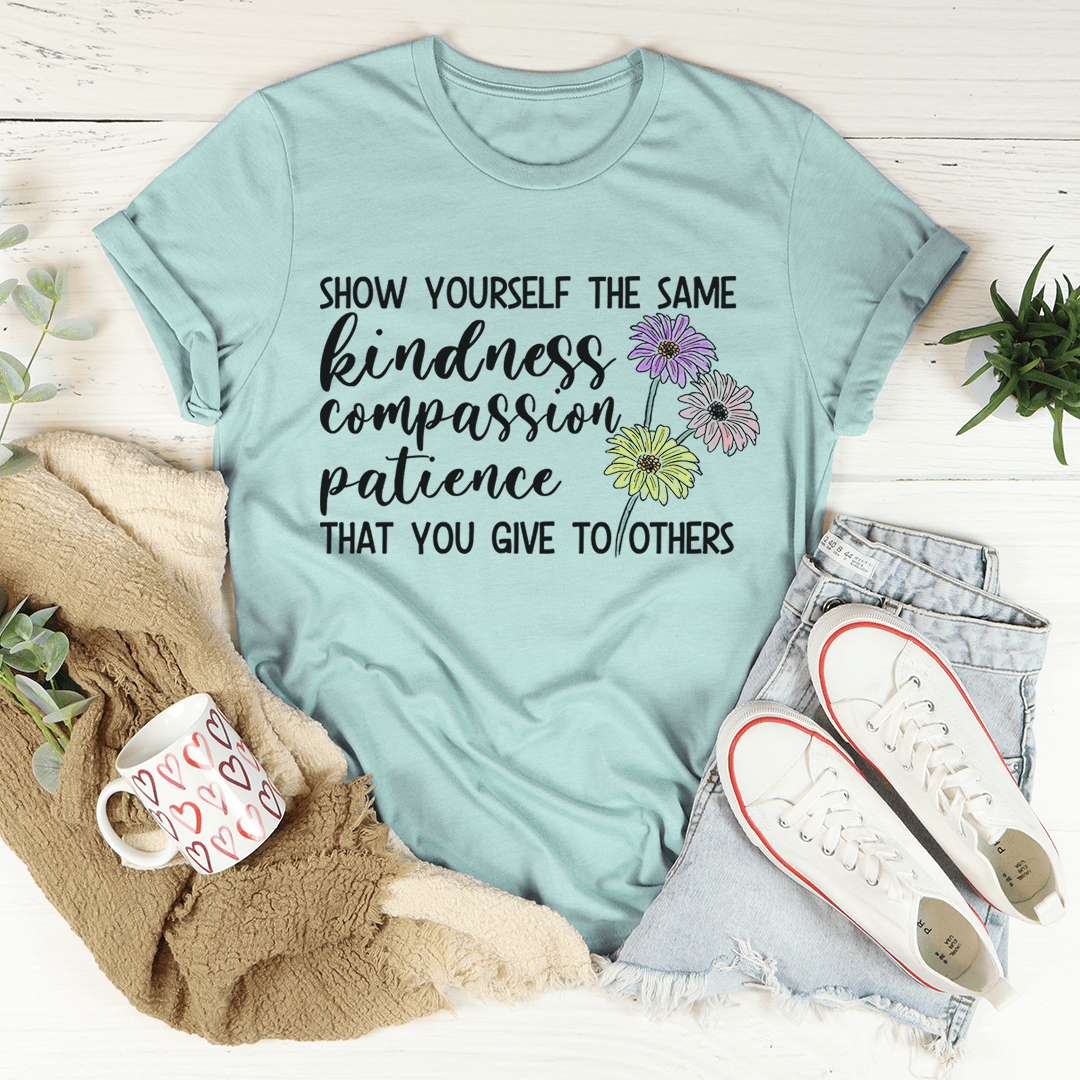 Dusty blue T-shirt with front text design and colorful flower graphic