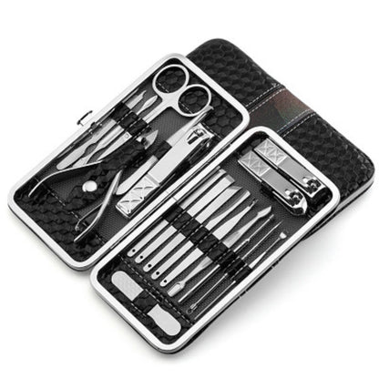 Stainless steel nail tool set in black hard case, open with multiple grooming implements