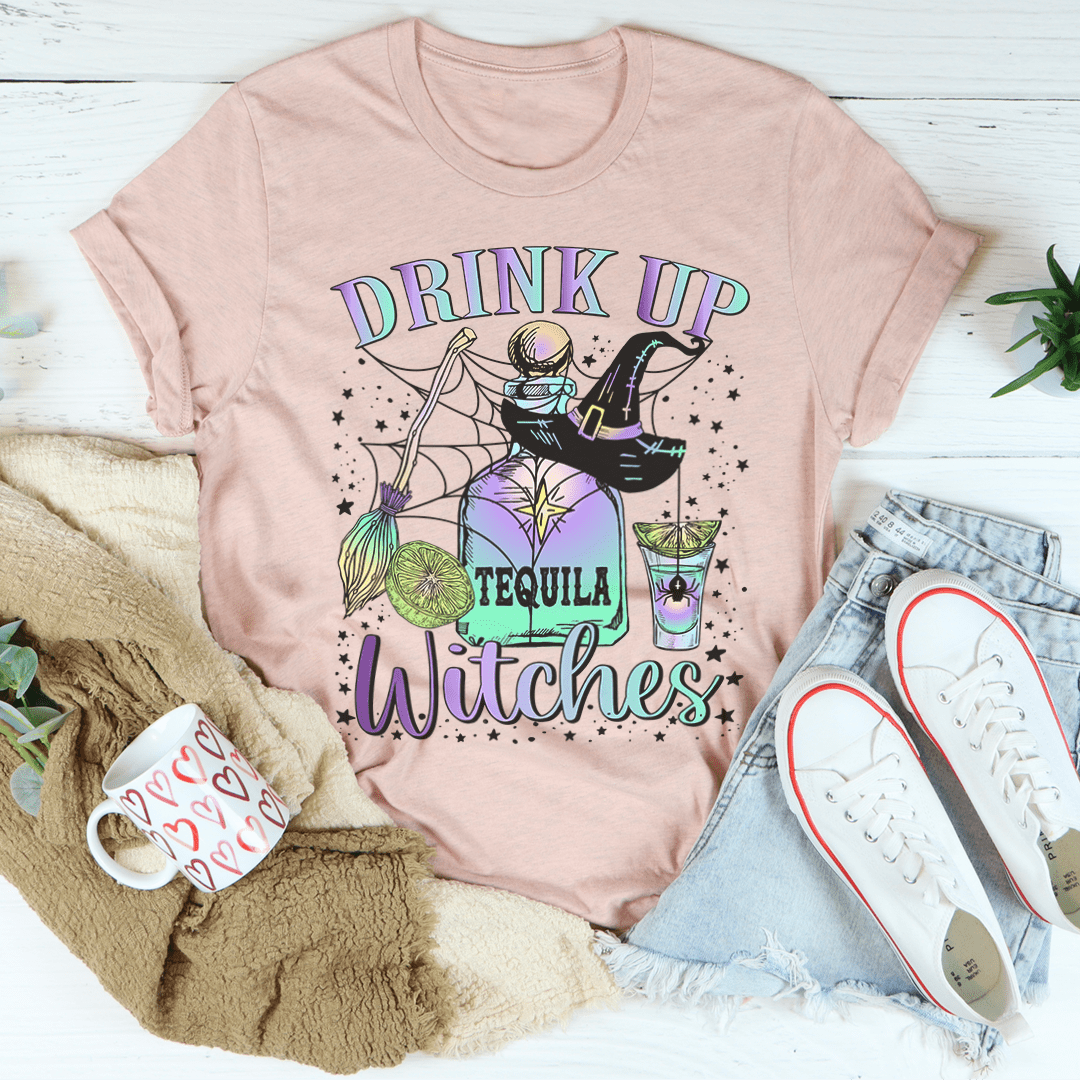 Peach heather T-shirt with witch holding a tequila drink graphic
