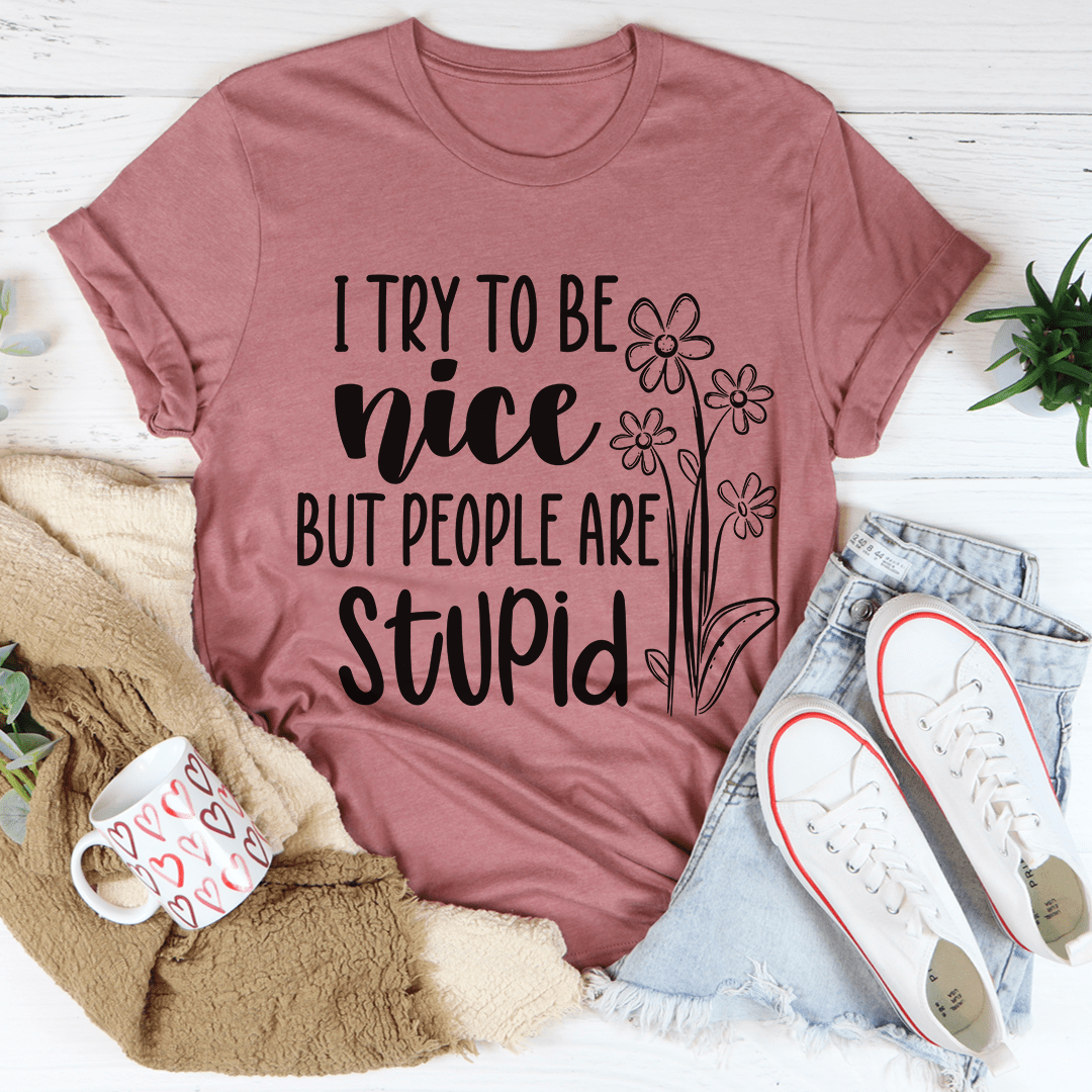 Mauve graphic T-shirt with 'I try to be nice' slogan and flower outline