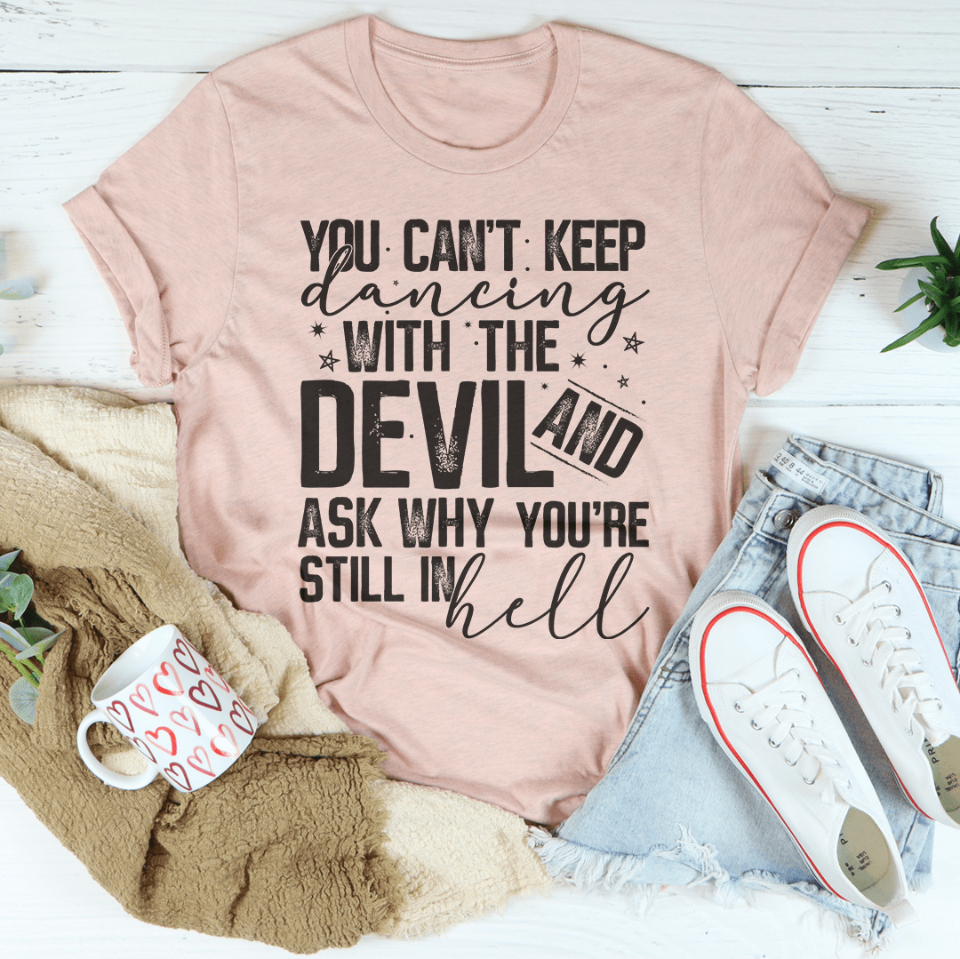 Blush pink crewneck T-shirt with 'DEVIL' and 'hell' front typography