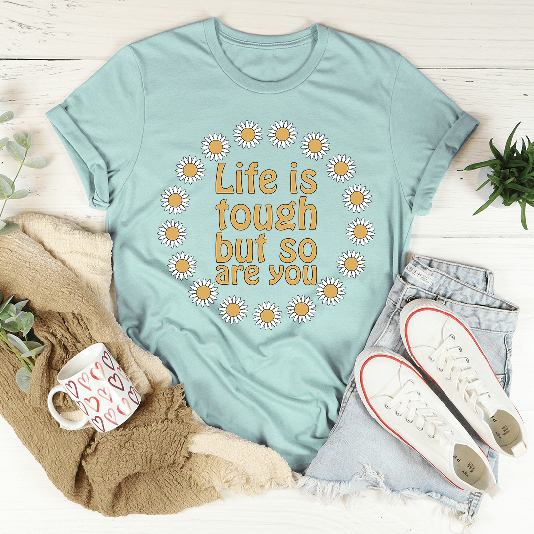 Light blue T-shirt with daisy 'Life is tough but so are you' print