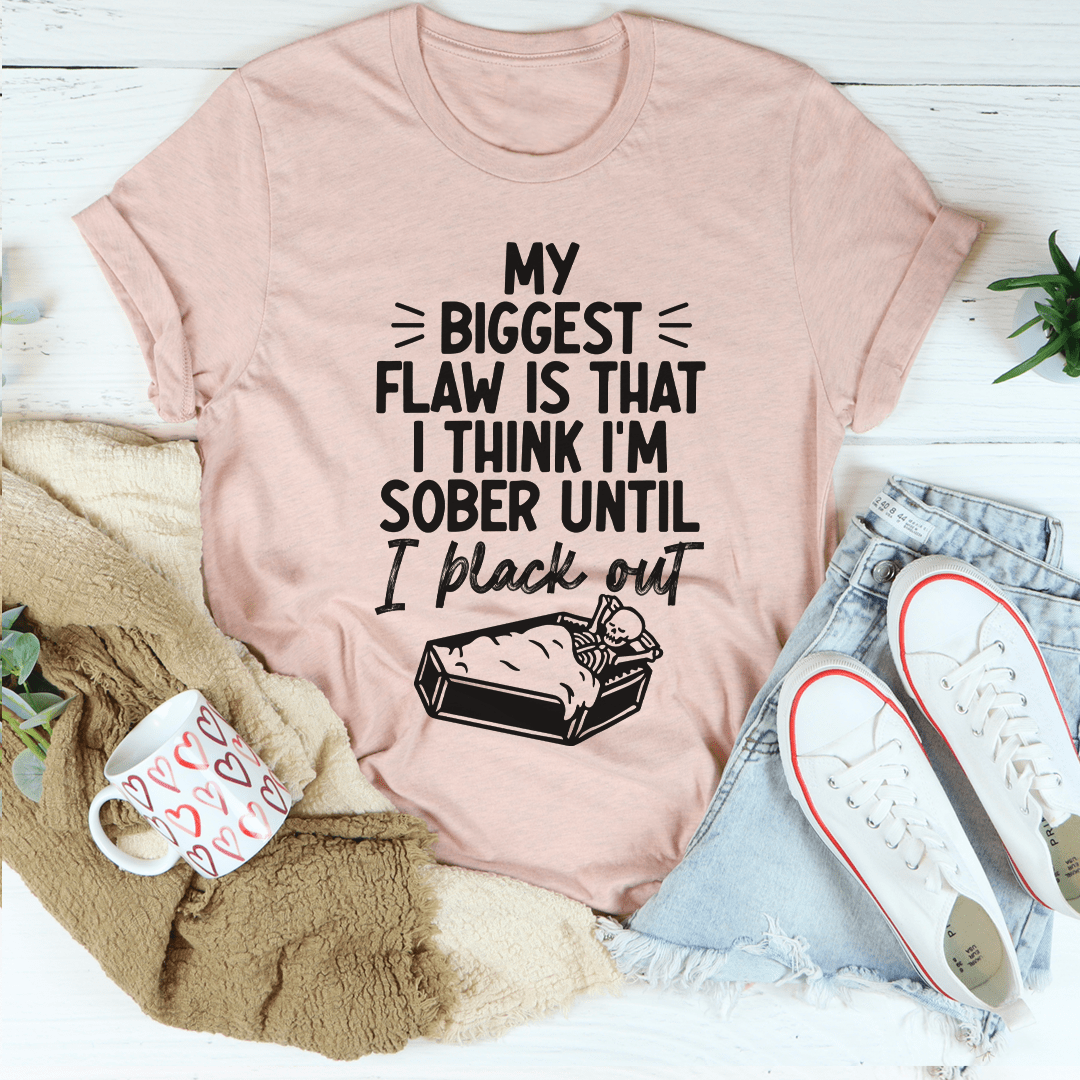Mauve crew-neck T-shirt with black slogan graphic and small bottle illustration at center.