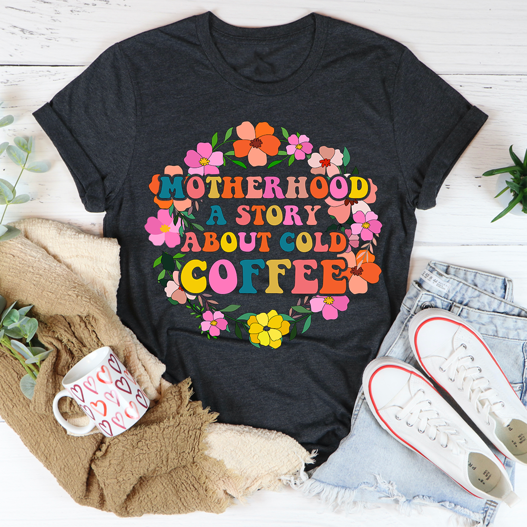 Dark grey crewneck T-shirt with floral “MOTHERHOOD A STORY ABOUT COLD COFFEE” print