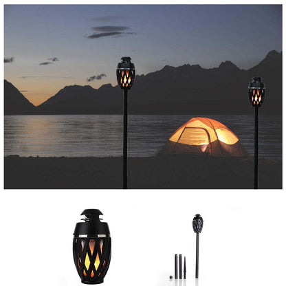 Outdoor LED torch light with black stick stand, glowing amber flame-pattern, one unit shown.