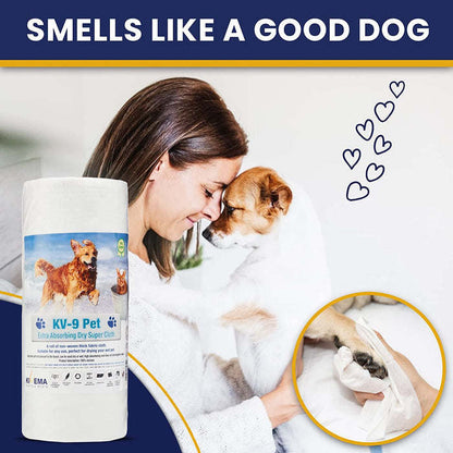 White roll of absorbent pet dry cloth wipes beside a dog being cleaned