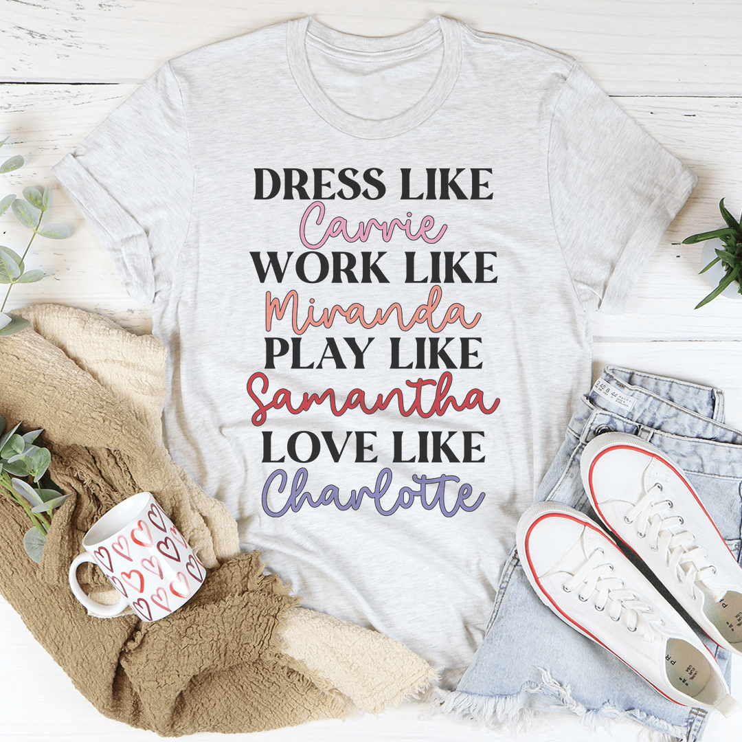 White crewneck T-shirt with colorful 'Dress Like Carrie' text graphic