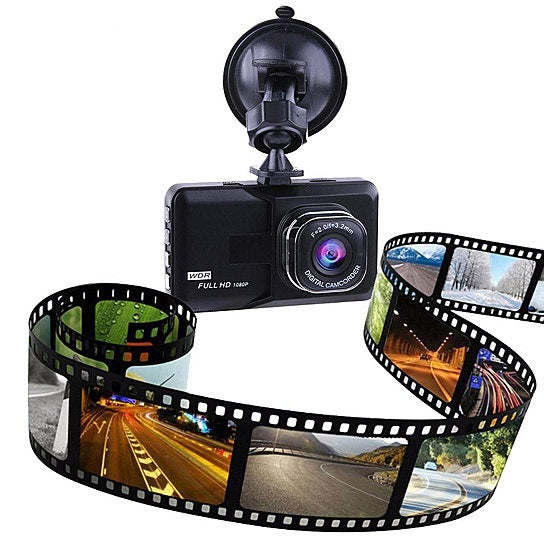 Car dash cam with mounted lens and looping film strip showing road footage