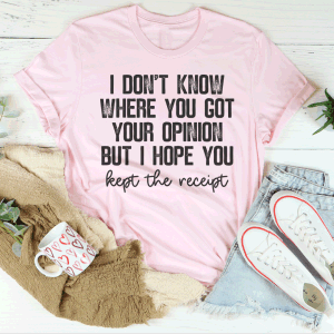 Light pink graphic crewneck T-shirt with centered slogan print