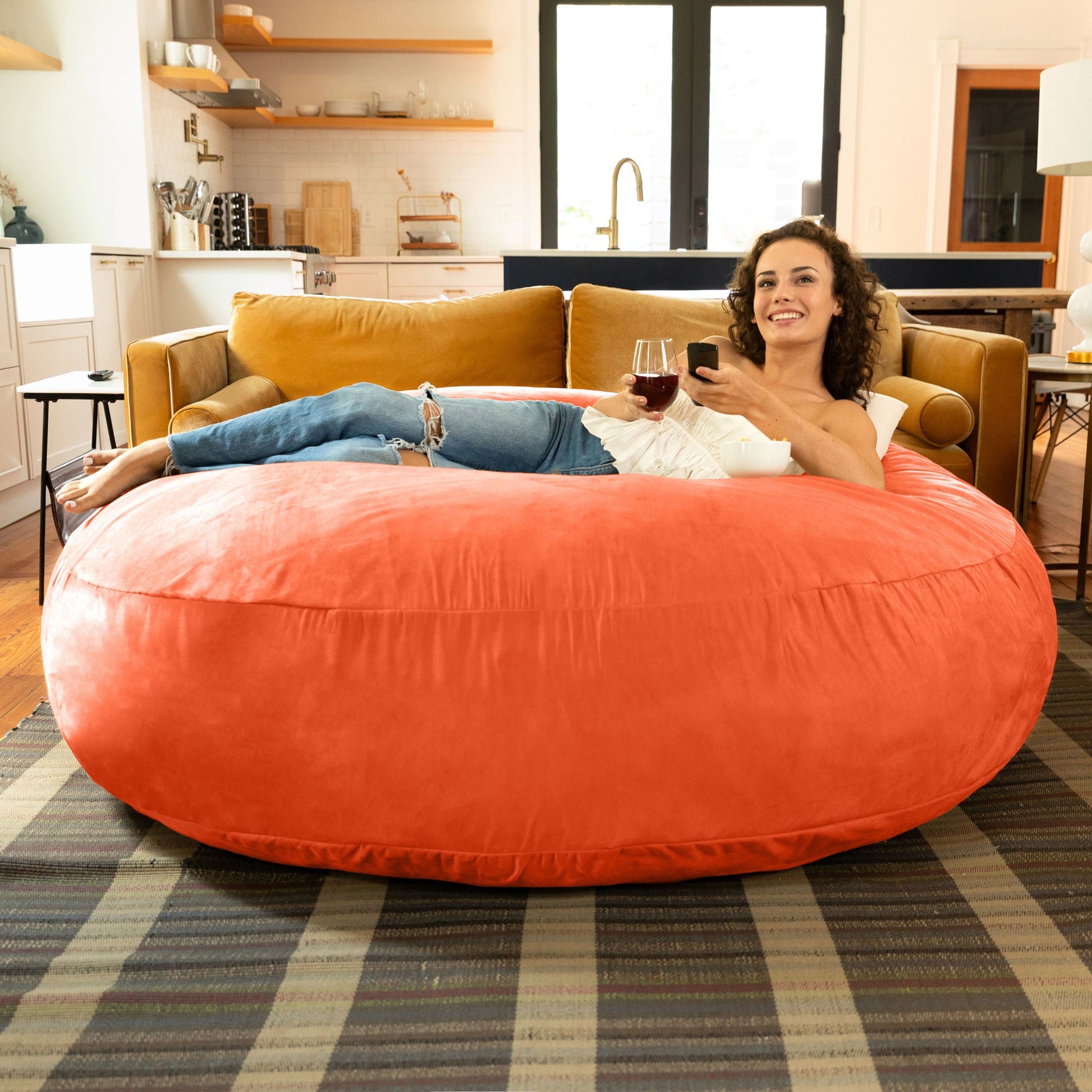 Mandarin orange cocoon bean bag chair with rounded shape and open top