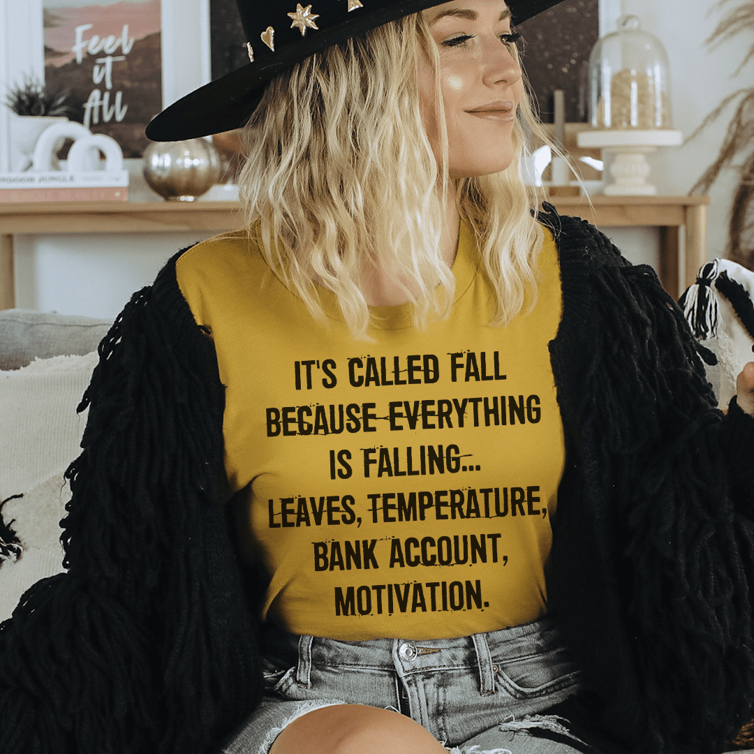 Mustard yellow graphic T-shirt with fall slogan text on front