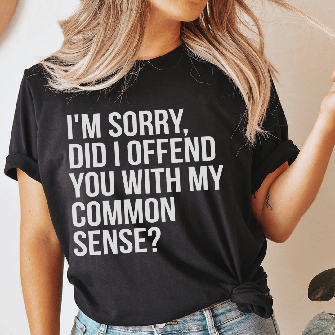 Black slogan T-shirt with 'I'm sorry, did I offend you...' large front text; crewneck
