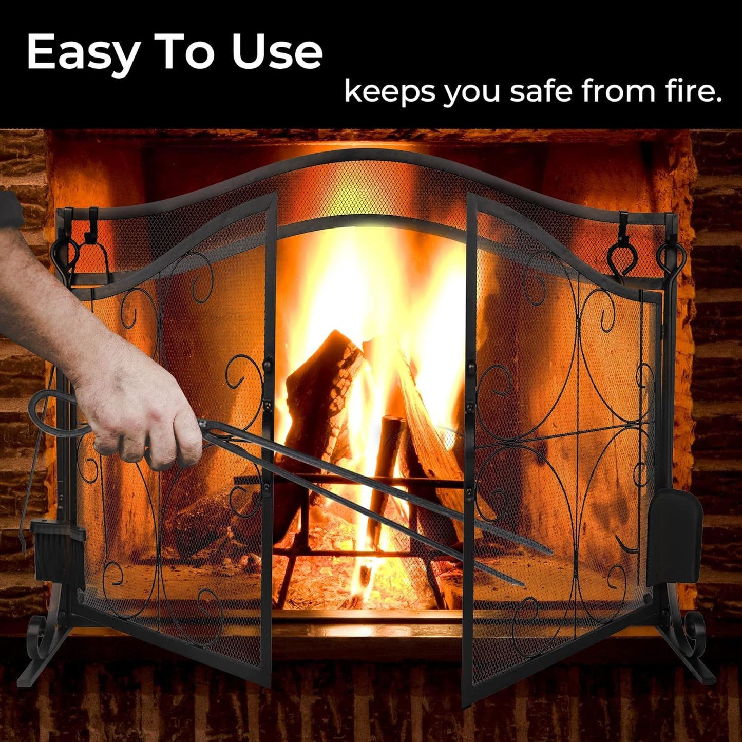 Arch metal fireplace screen with two doors; hand adjusts the front bar handle