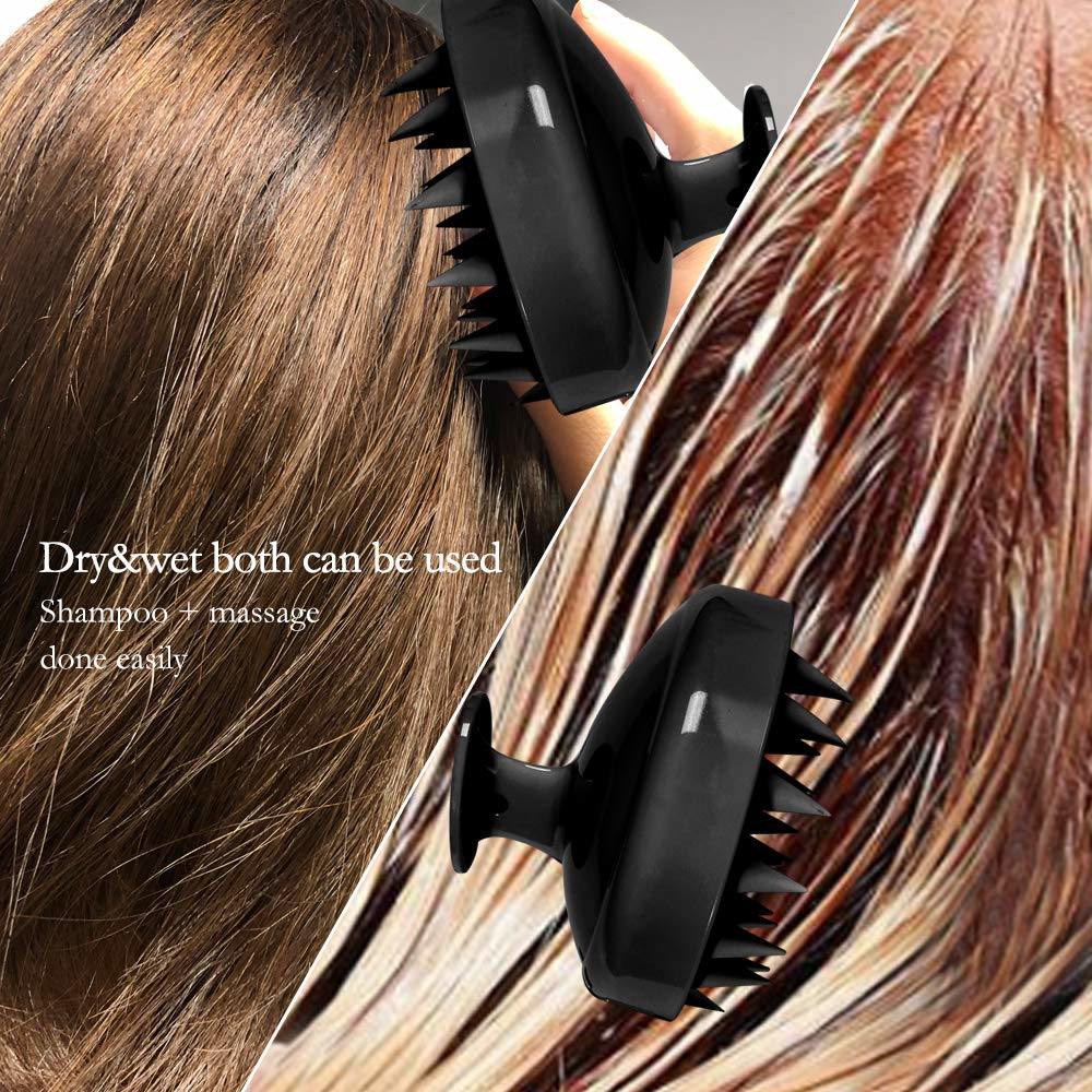 Black scalp massage brush with pointed spikes brushing through hair