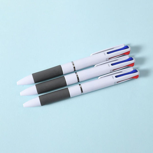 Three-color ballpoint pen set with white barrel, dark gray grip, push tips in red and blue
