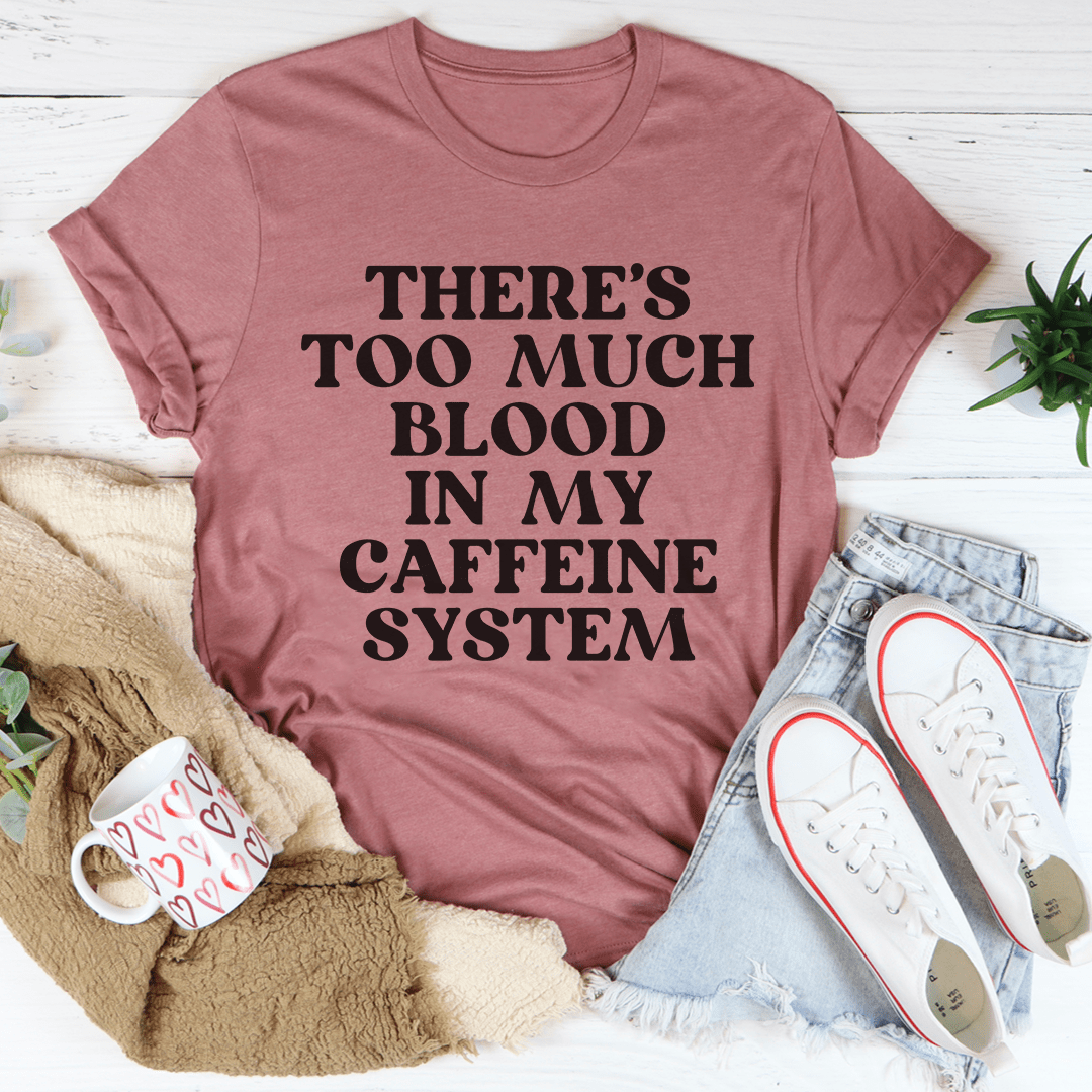 Mauve T-shirt with bold black quote 'THERE'S TOO MUCH BLOOD...' graphic