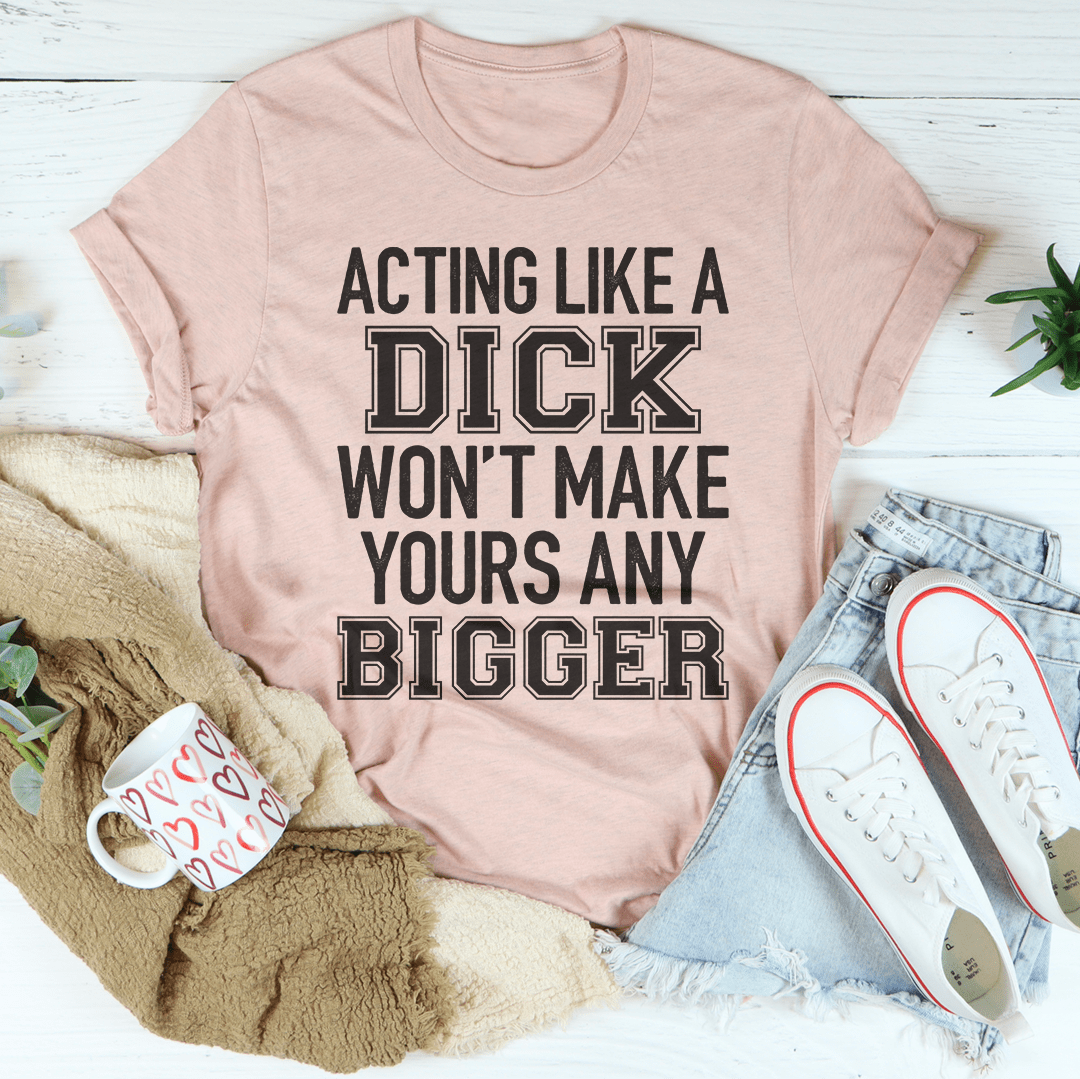 Light pink crewneck T-shirt with bold 'ACTING LIKE A DICK' front graphic