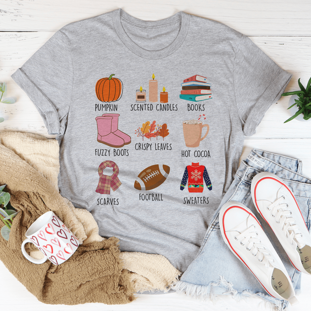 Athletic heather crewneck fall t-shirt with pumpkin, candles, books, and seasonal icons print