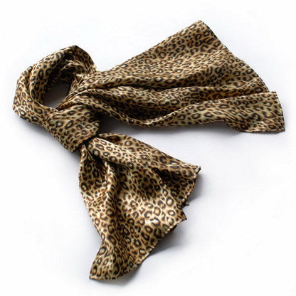 Leopard print silk scarf with tied knot, brown and black, small wrap style.