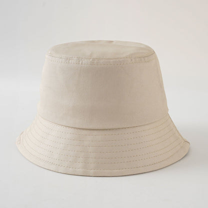 Beige cotton fisherman hat, solid color bucket style with stitched brim details