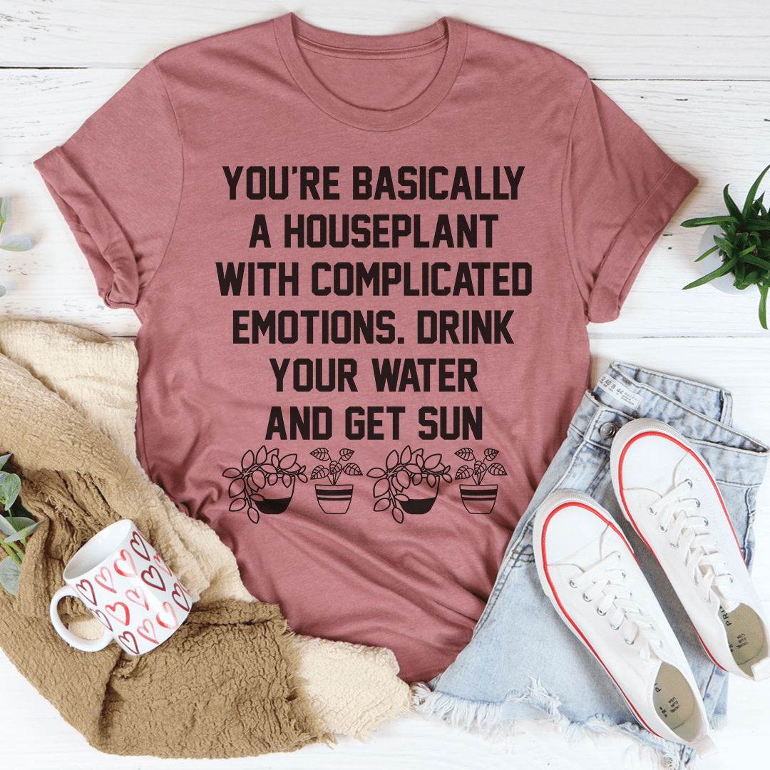 Heather Prism Peach houseplant quote T-shirt with potted plant graphic at hem