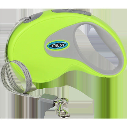 Green retractable pet leash reel close-up with grey handle and nylon cord outlet