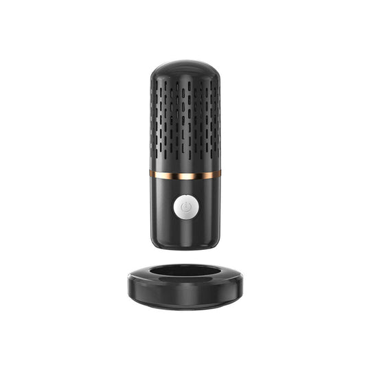 Ultrasonic fruits and veggie cleaner, black handheld cylinder with perforated top and base