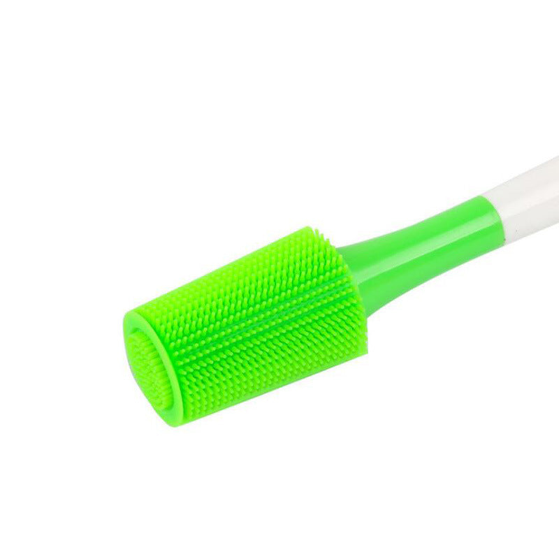 Silicone bottle cleaning brush with bright green cylindrical scrubbing pad and long white handle