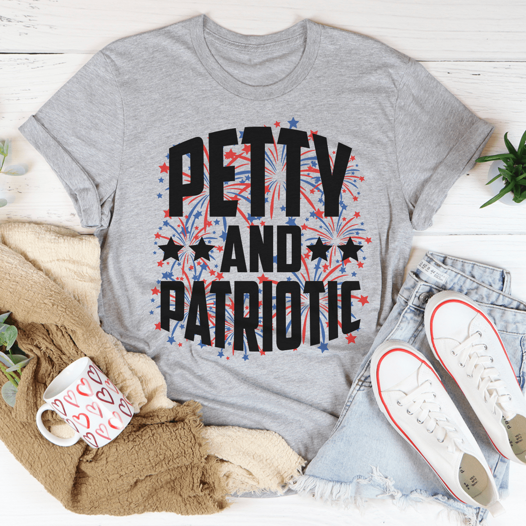 Gray crew-neck T-shirt with bold patriotic text and starburst design, short sleeves