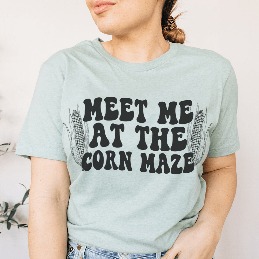 Dusty blue T-shirt with 'MEET ME AT THE CORN MAZE' front graphic