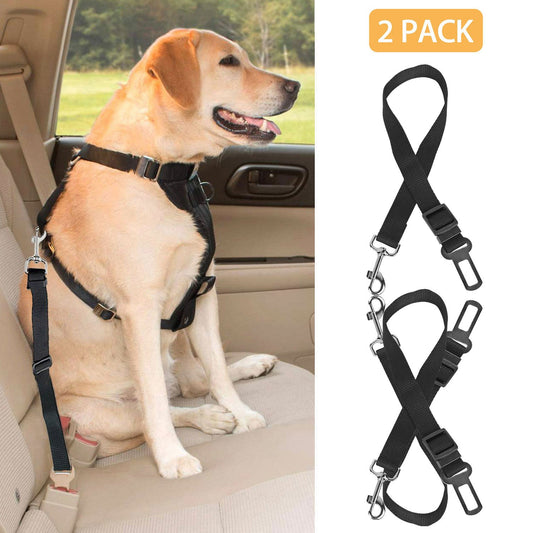 Black pet safety seat belt leash set attached to a dog harness in a car seat.