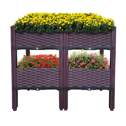 Dark purple raised garden bed planter with four compartments and four legs, topped with flowers
