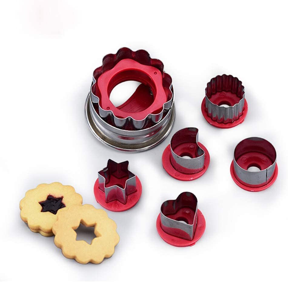 Red and stainless cookie cutter set with star and heart shaped pastry molds