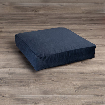 Indigo plush microvelvet floor pillow, low rectangular cushion on wood floor