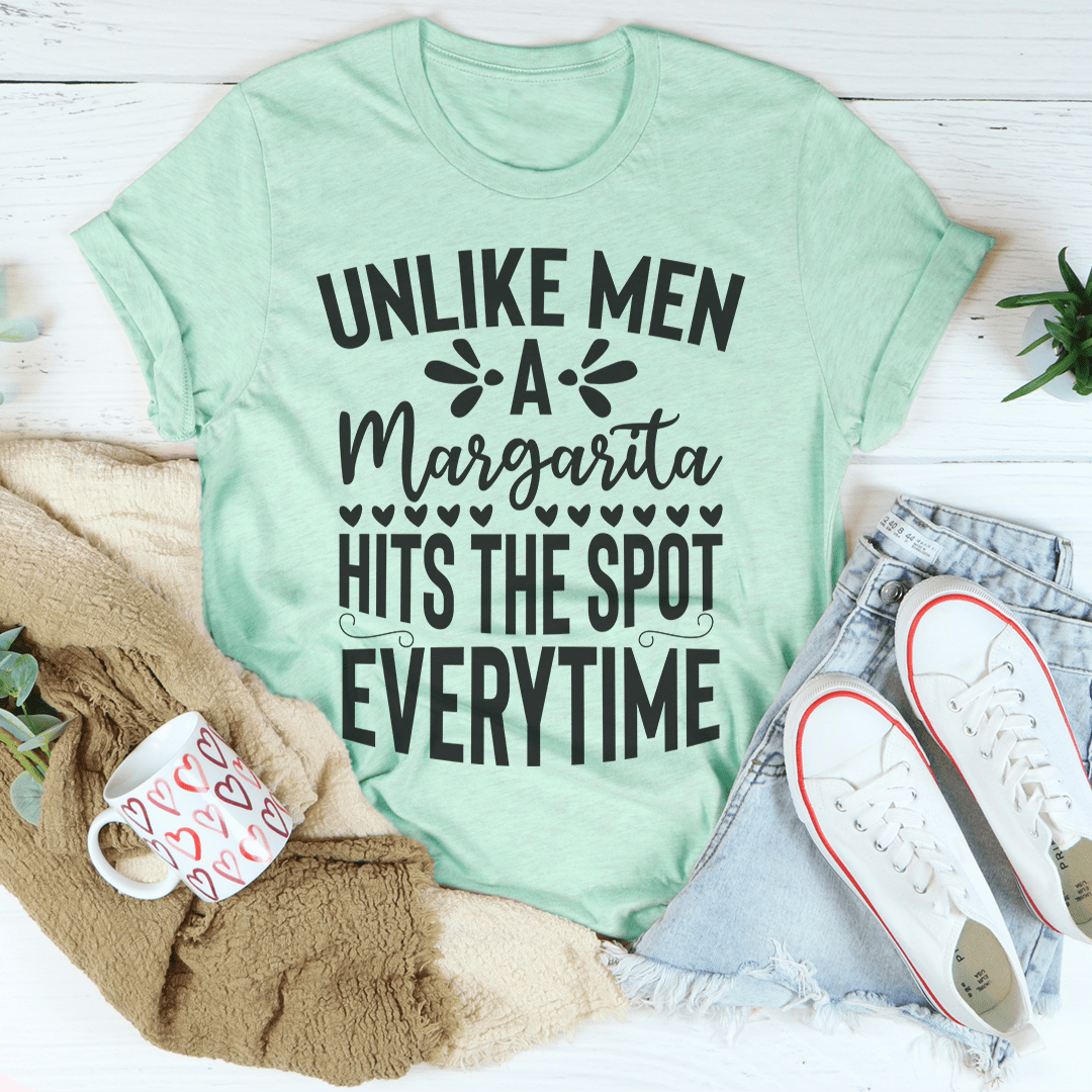 Mint green T-shirt with black slogan graphic reading “UNLIKE MEN Margarita”