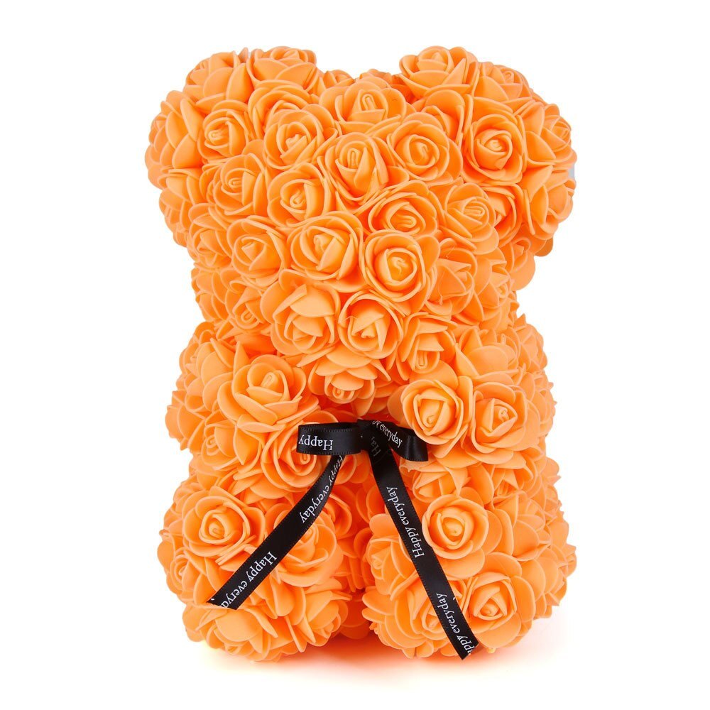 Orange rose teddy bear covered in rosette flowers, with black ribbon bow