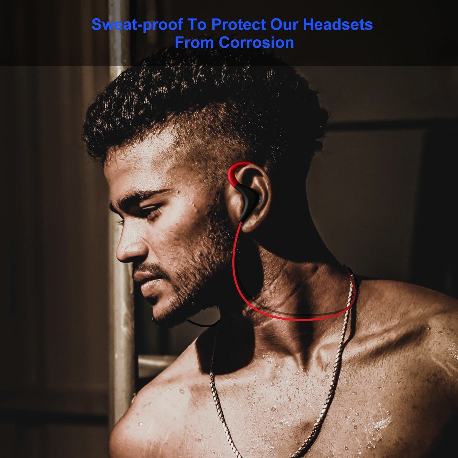 Red and black wireless in-ear headset with over-ear hook and red connecting cable
